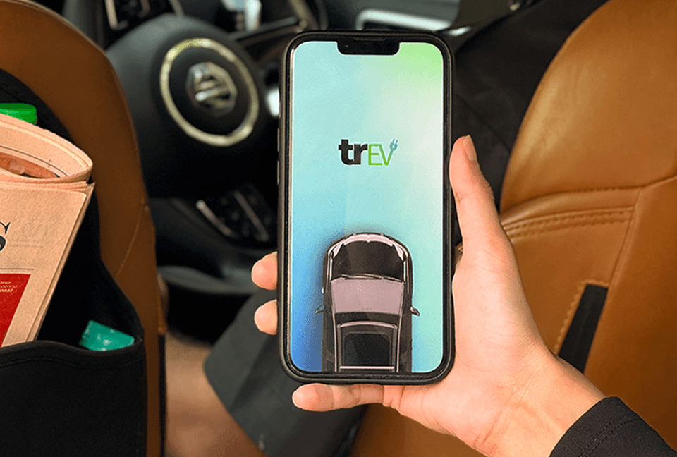 Download the Trev app — phone in vehicle
